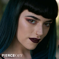stunning alternative girl with nose ring and medusa lip piercing stud